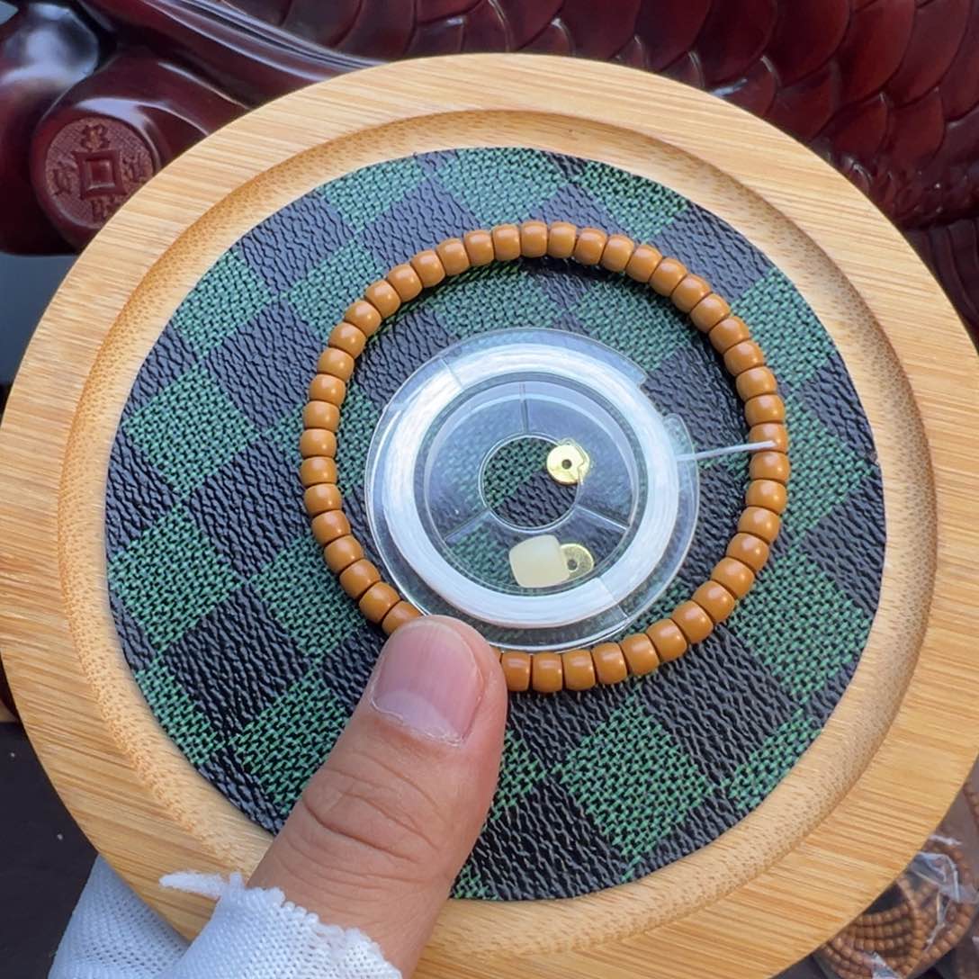 橄榄核吊坠0.55核尖手串