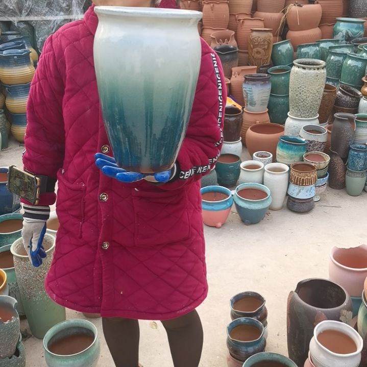 红陶口20高31…一个盆子。