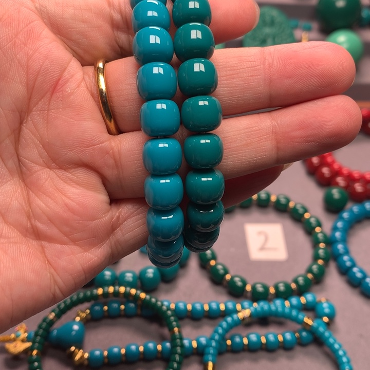 石材杨***?卡10蓝色，蓝绿老型手串各一