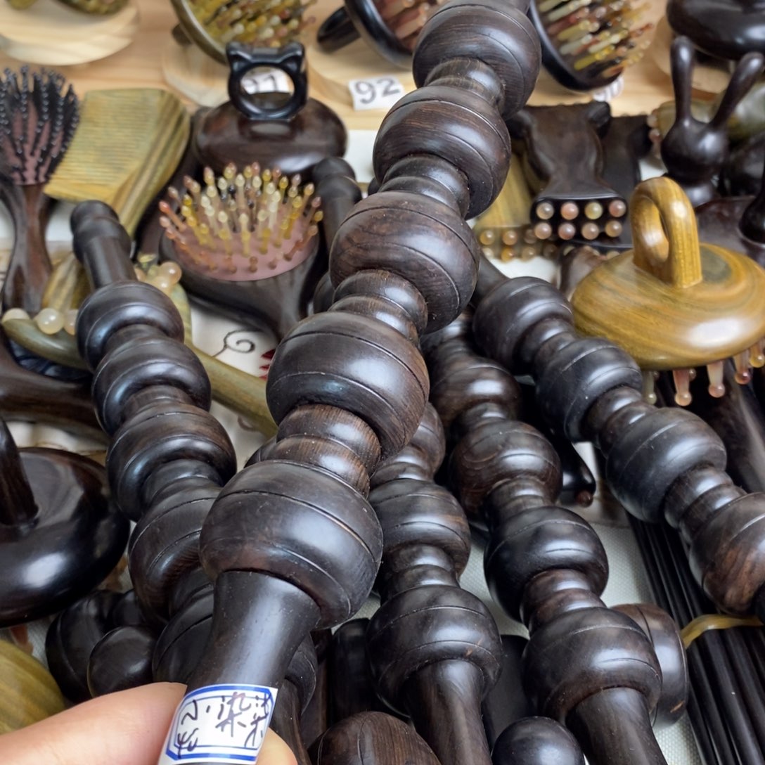 紫光檀按摩梳子按摩疏通