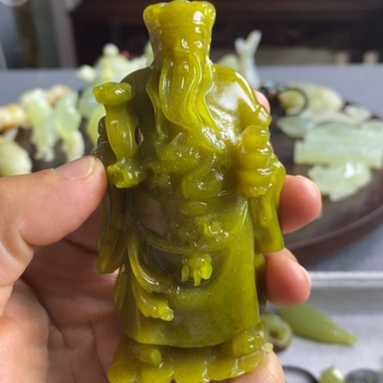 蛇纹石玉未镶嵌手把件笑**语