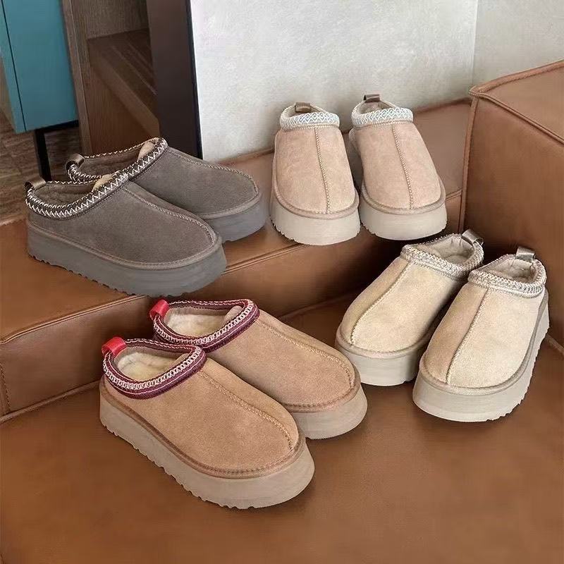 u家民族风雪地靴牛皮羊毛保暖时尚增高厚底