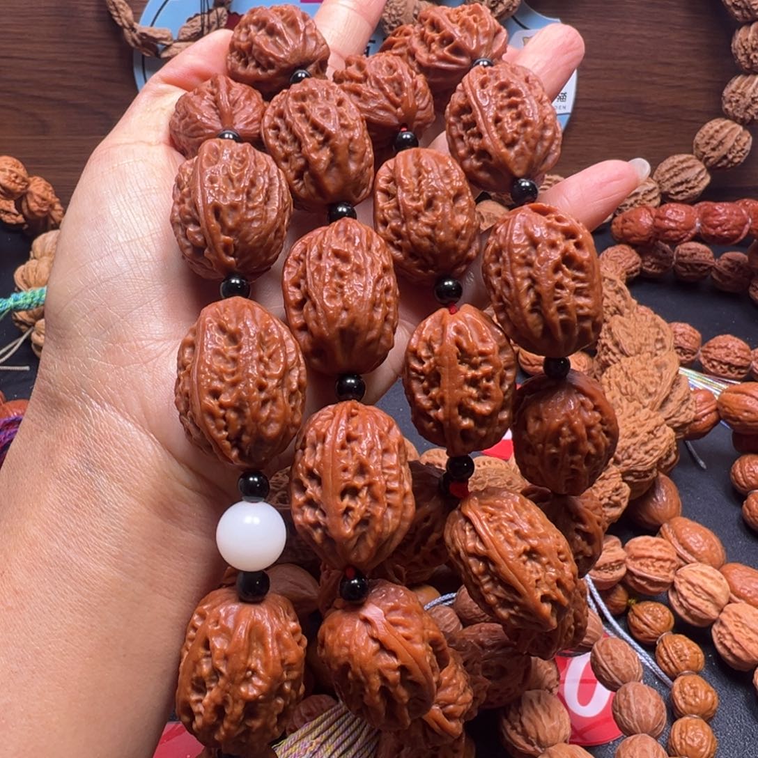 小***.文玩核桃吊坠野生小核桃23加