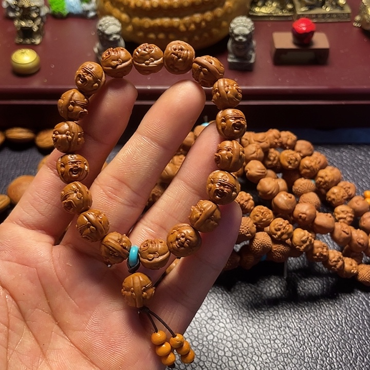 龙纹桃核雕刻双面财迷