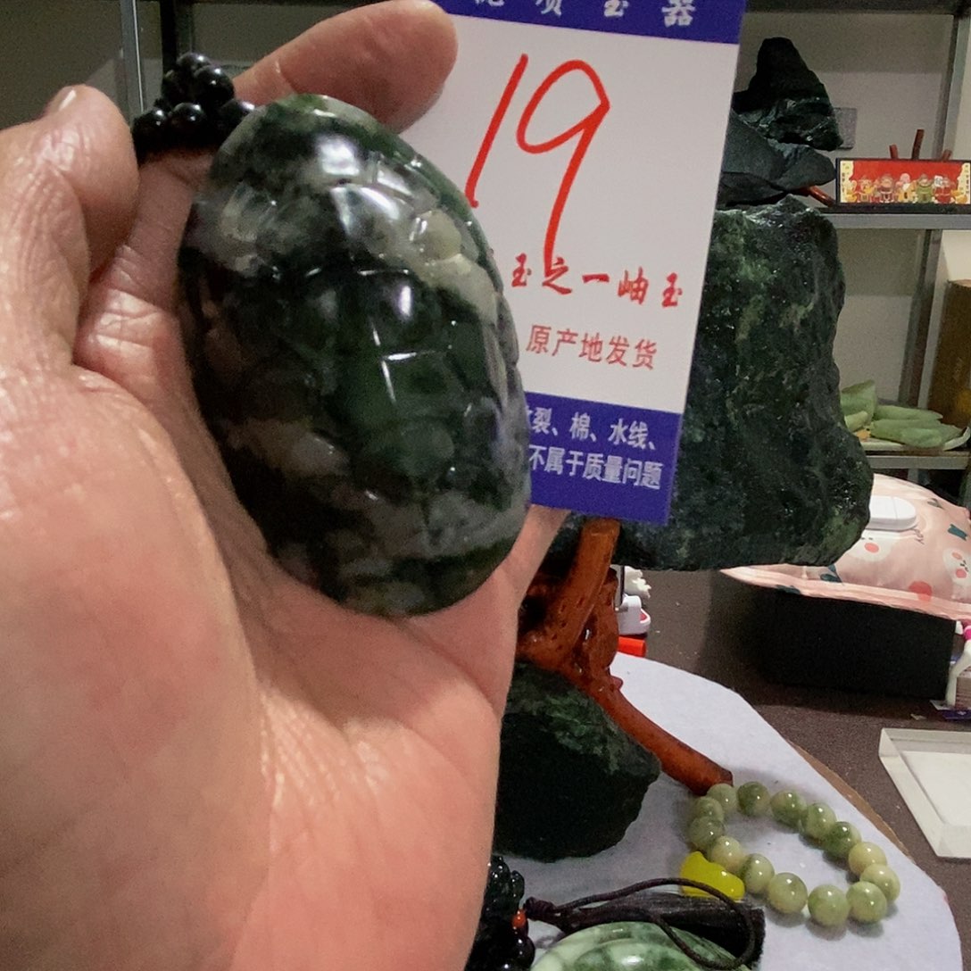 未镶嵌蛇纹石玉手把件翰*