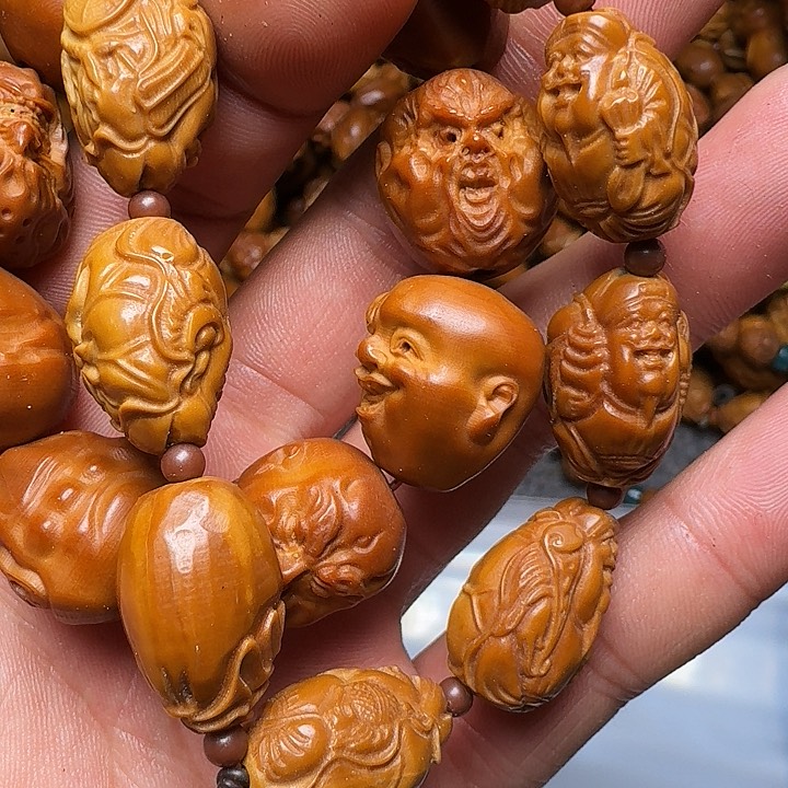 橄榄核手串你是谁