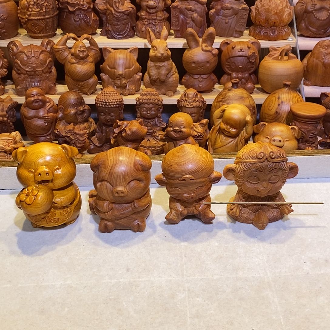 心***简木崖柏木雕手把件