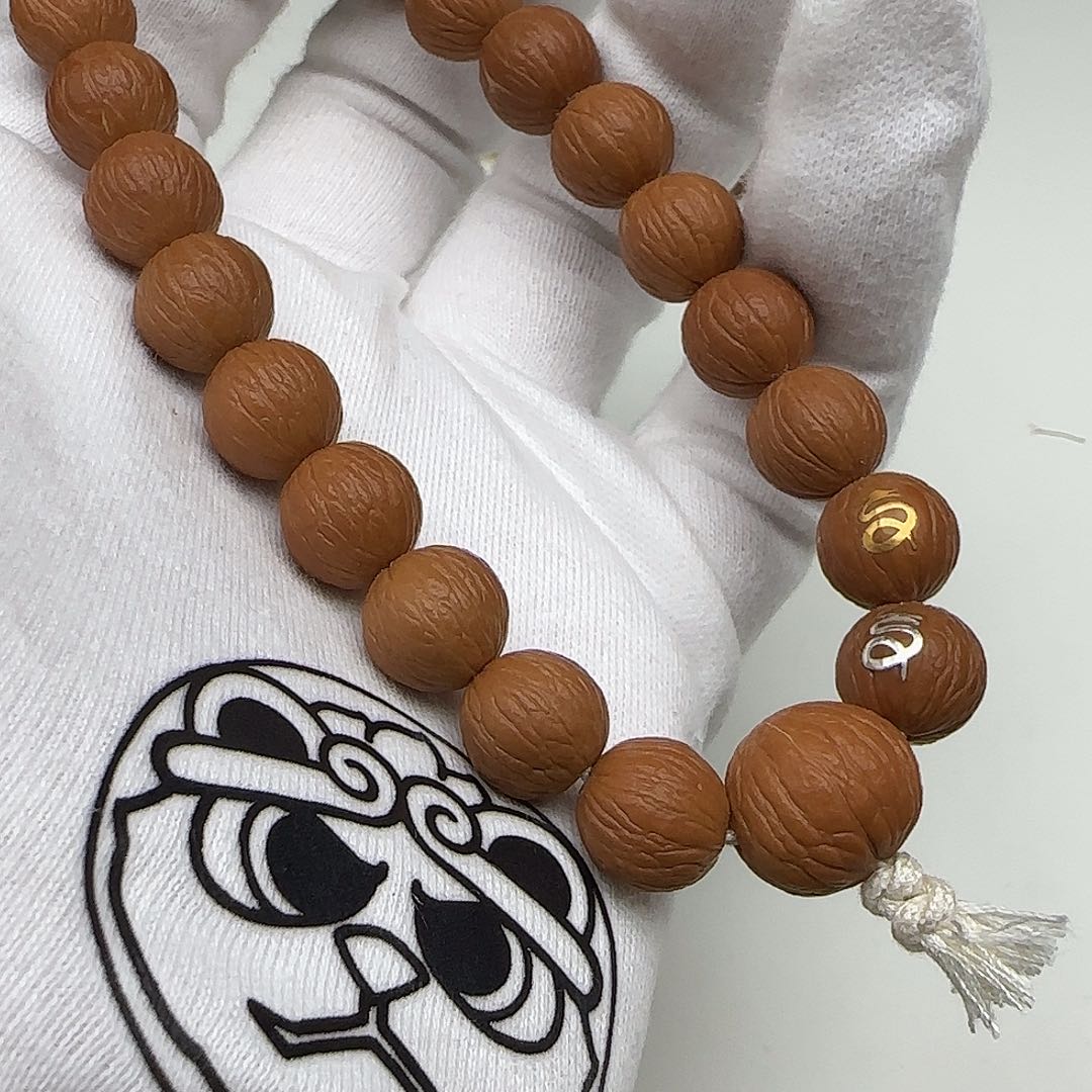 莫***古猴头核桃手串手持一条