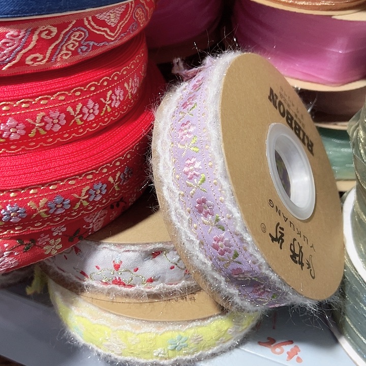 2.5的紫色毛边刺绣一枝花10码