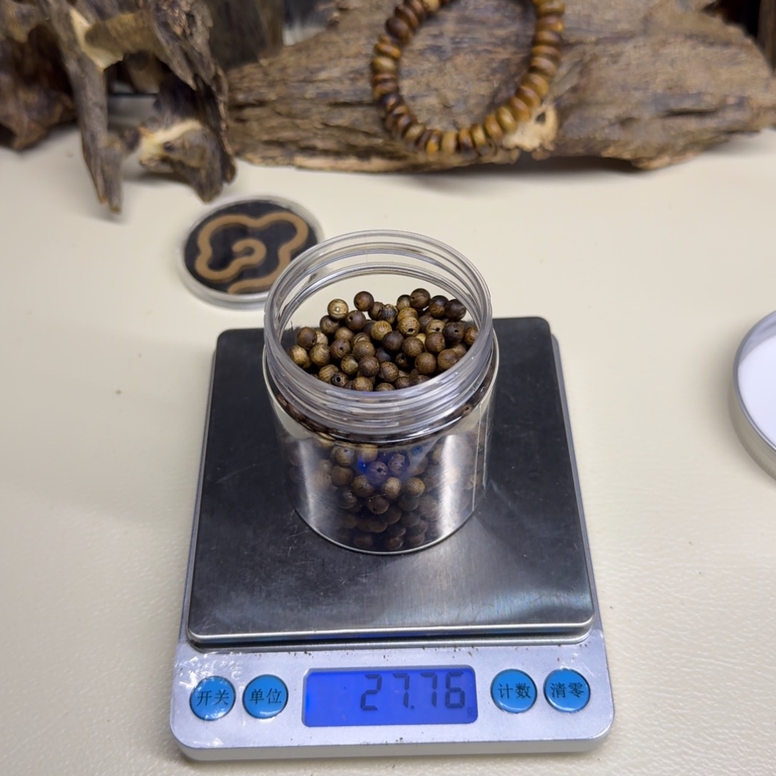 若***香榧木奇楠瑕疵珠27.7克