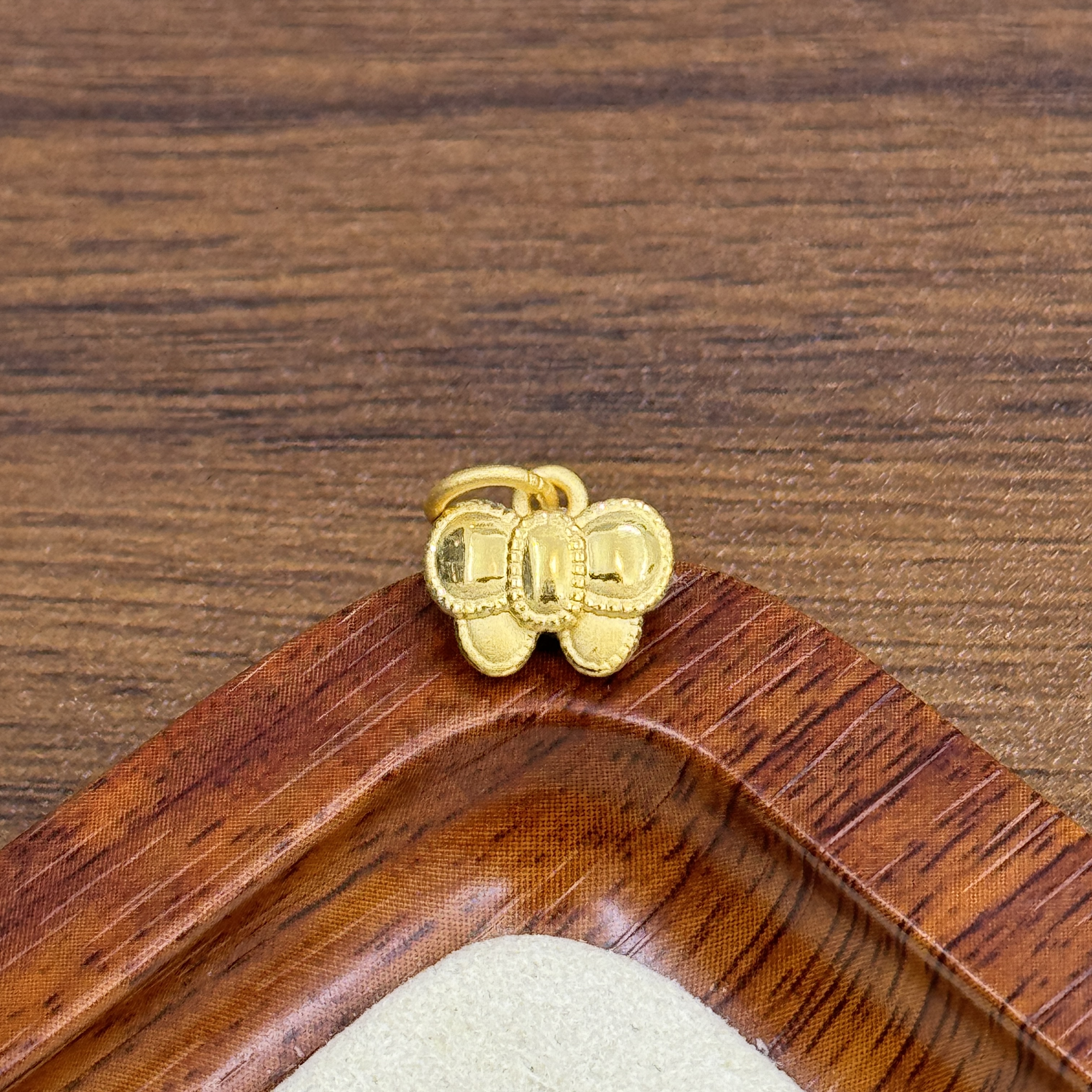 辉通黄金足金999光面蝴蝶结提溜DP2269