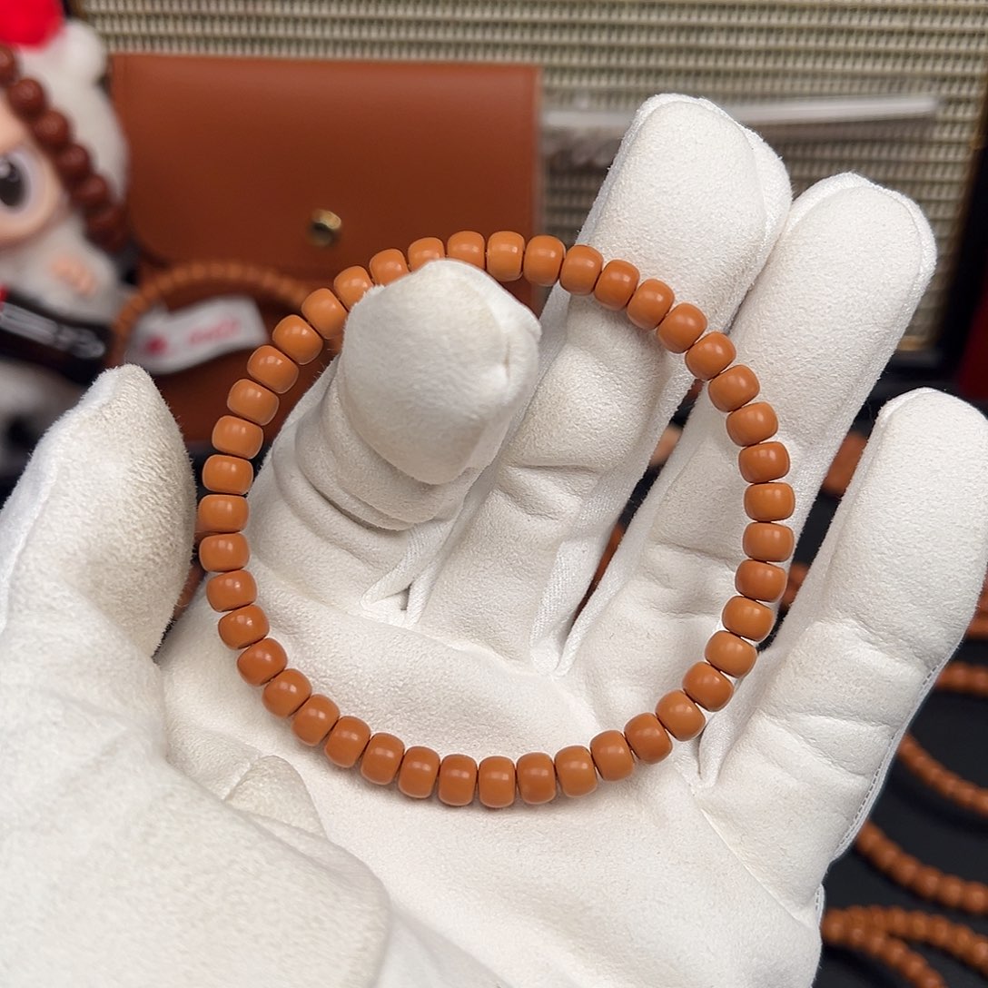 张***E橄榄核手串核尖单圈6.0