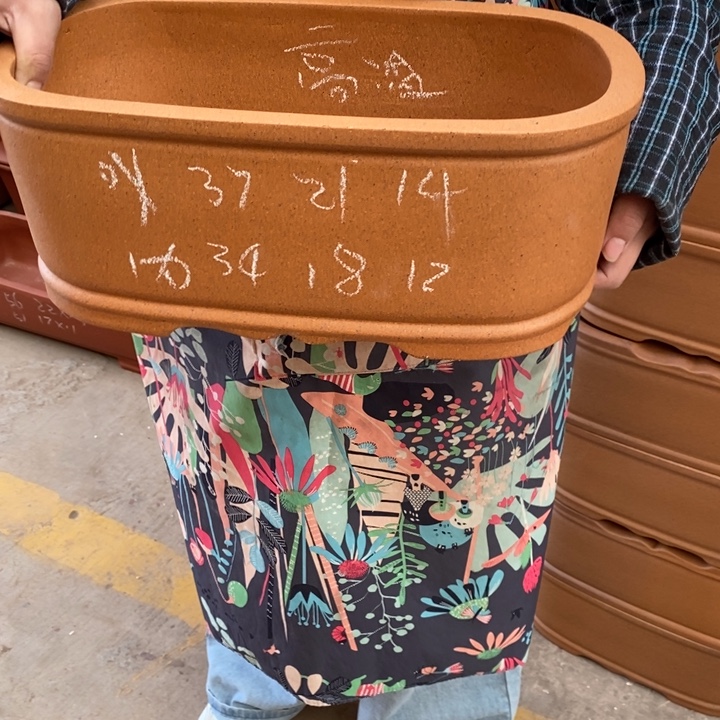 紫砂花盆只顾吃瓜