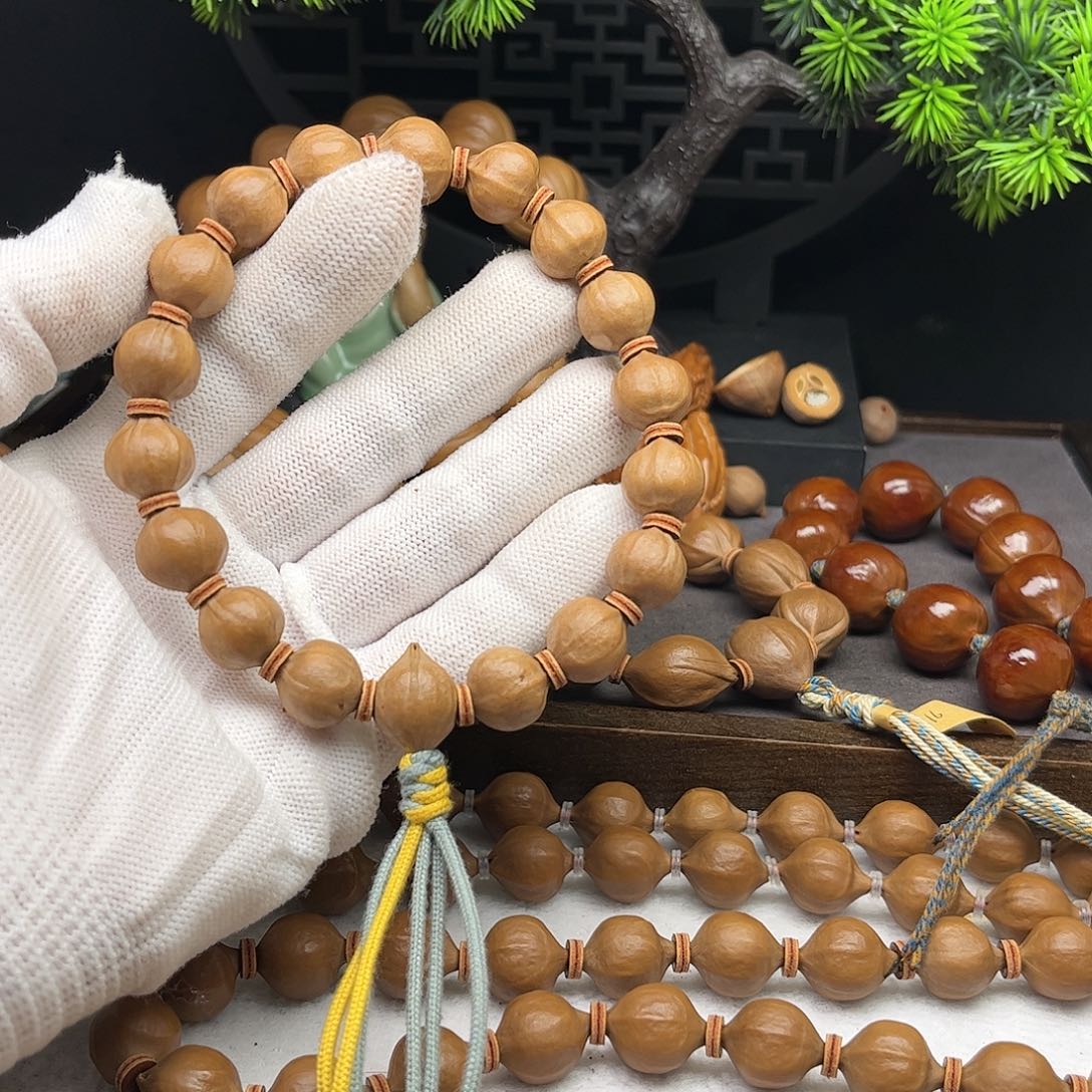 手串/手链橄榄核泗****行1.2*1.3原皮蜜桃臀铁核