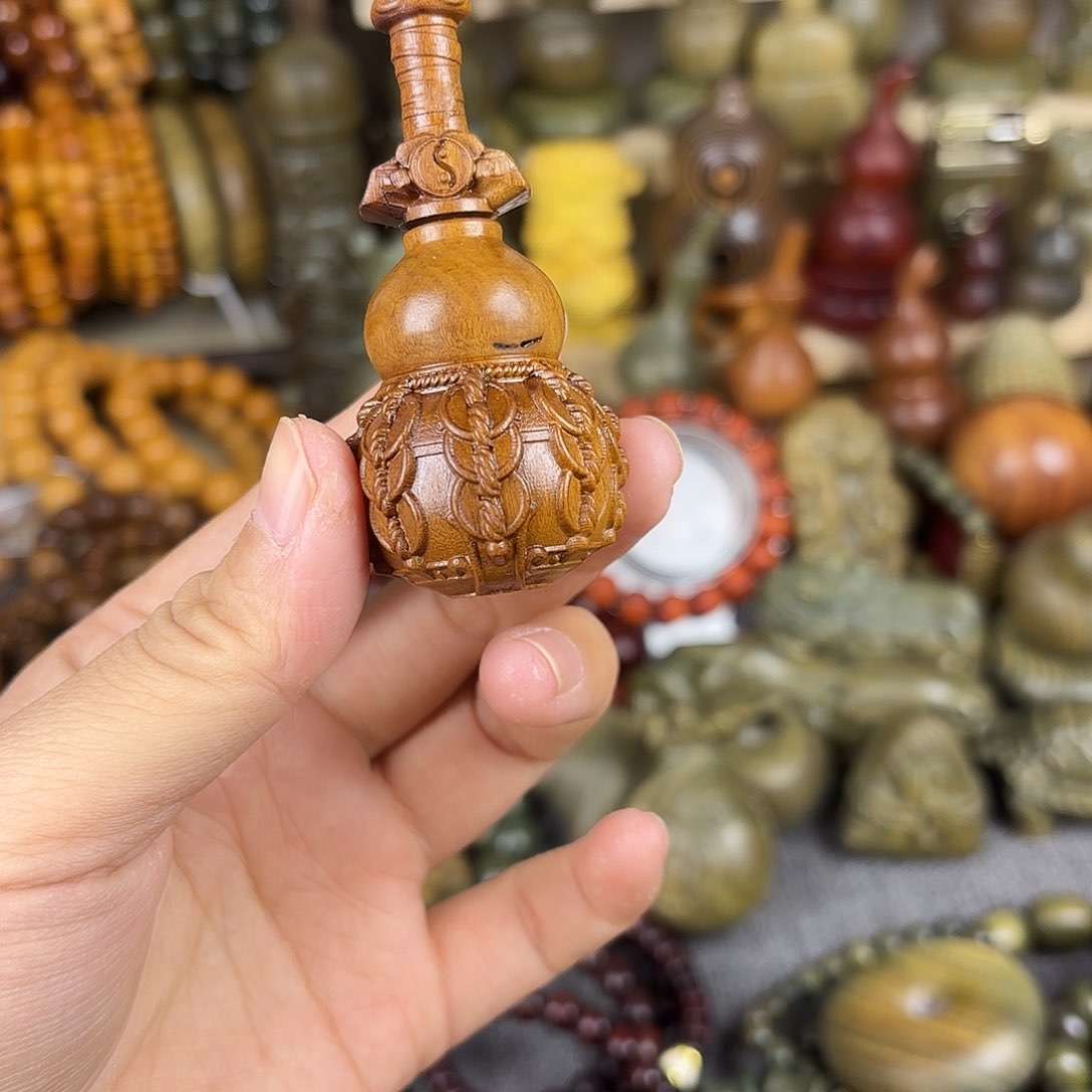 绿檀枣木养剑壶手把件