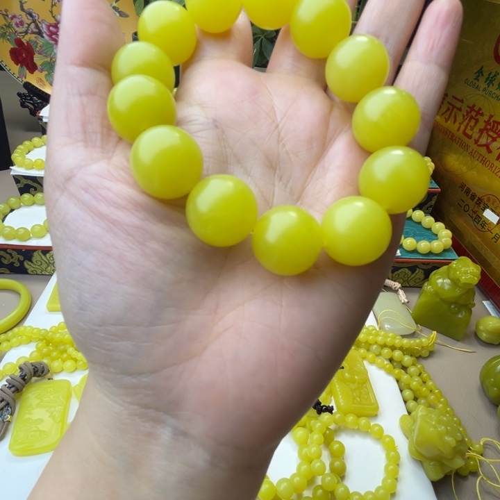 仲***三新疆若羌黄口手串