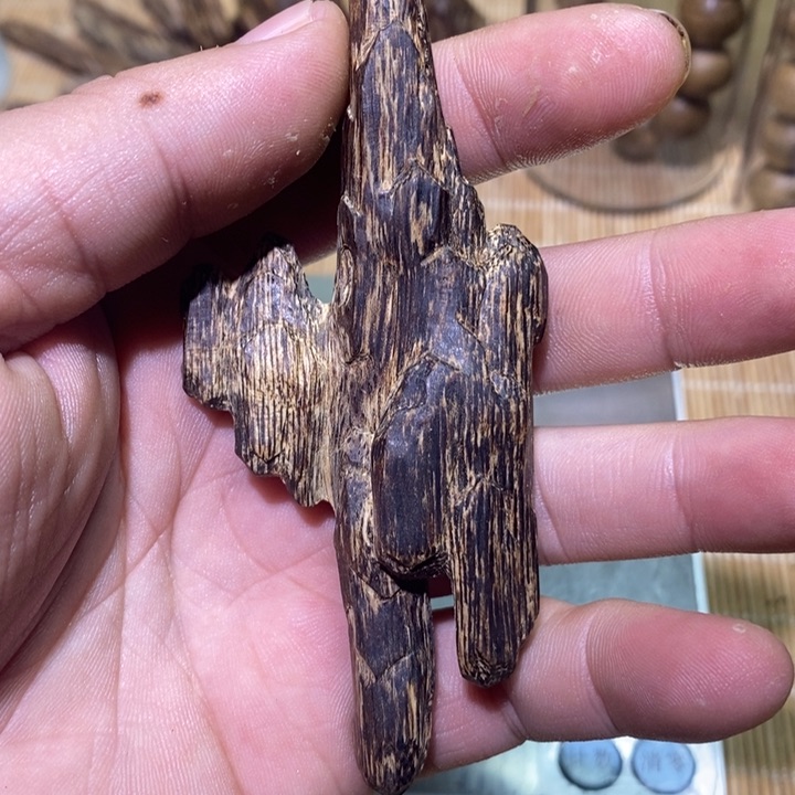 沉香手把件达拉干的