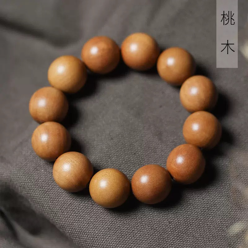 032野生桃木2.0手串