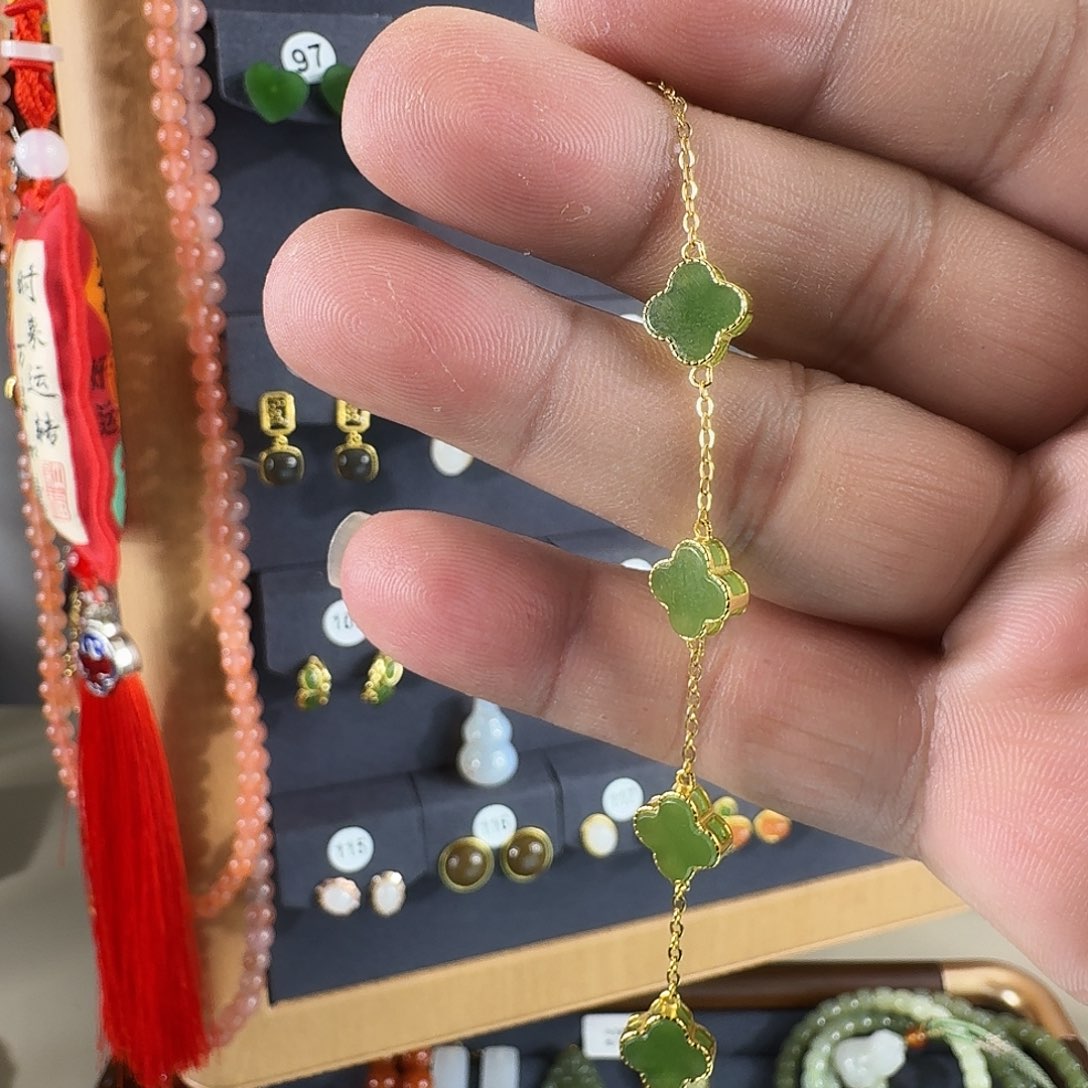 周***红和田玉（糖玉）银S925镶嵌手链