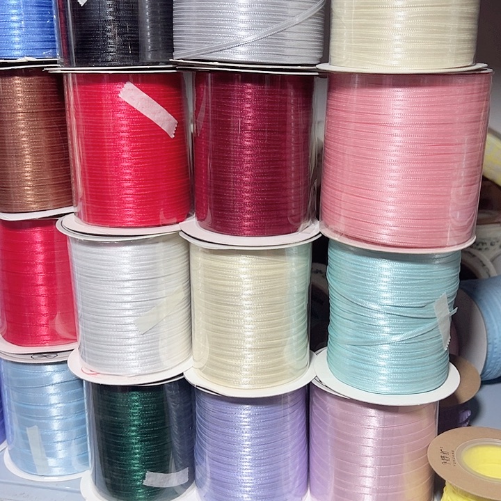 0.3的高亮缎带浅粉浅蓝浅紫米色黑色大红各50码