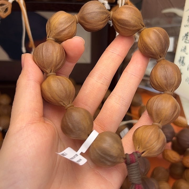 游***余橄榄核吊坠紫皮四花橄榄核