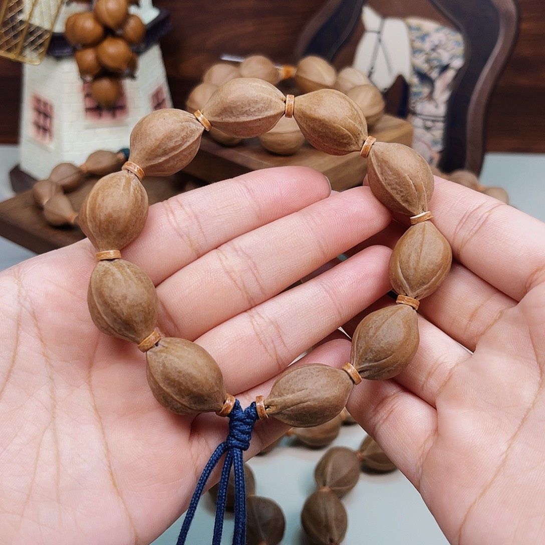 低***调橄榄核手串梅林铁核1724