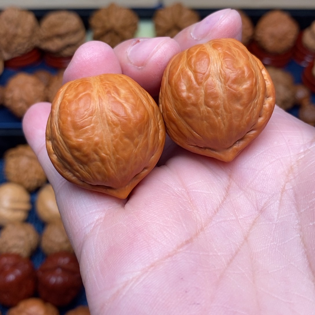 文玩核桃把件?**瘾手捻