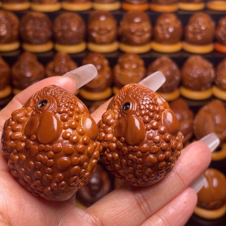 橄榄核把件高**风橄榄雕刻