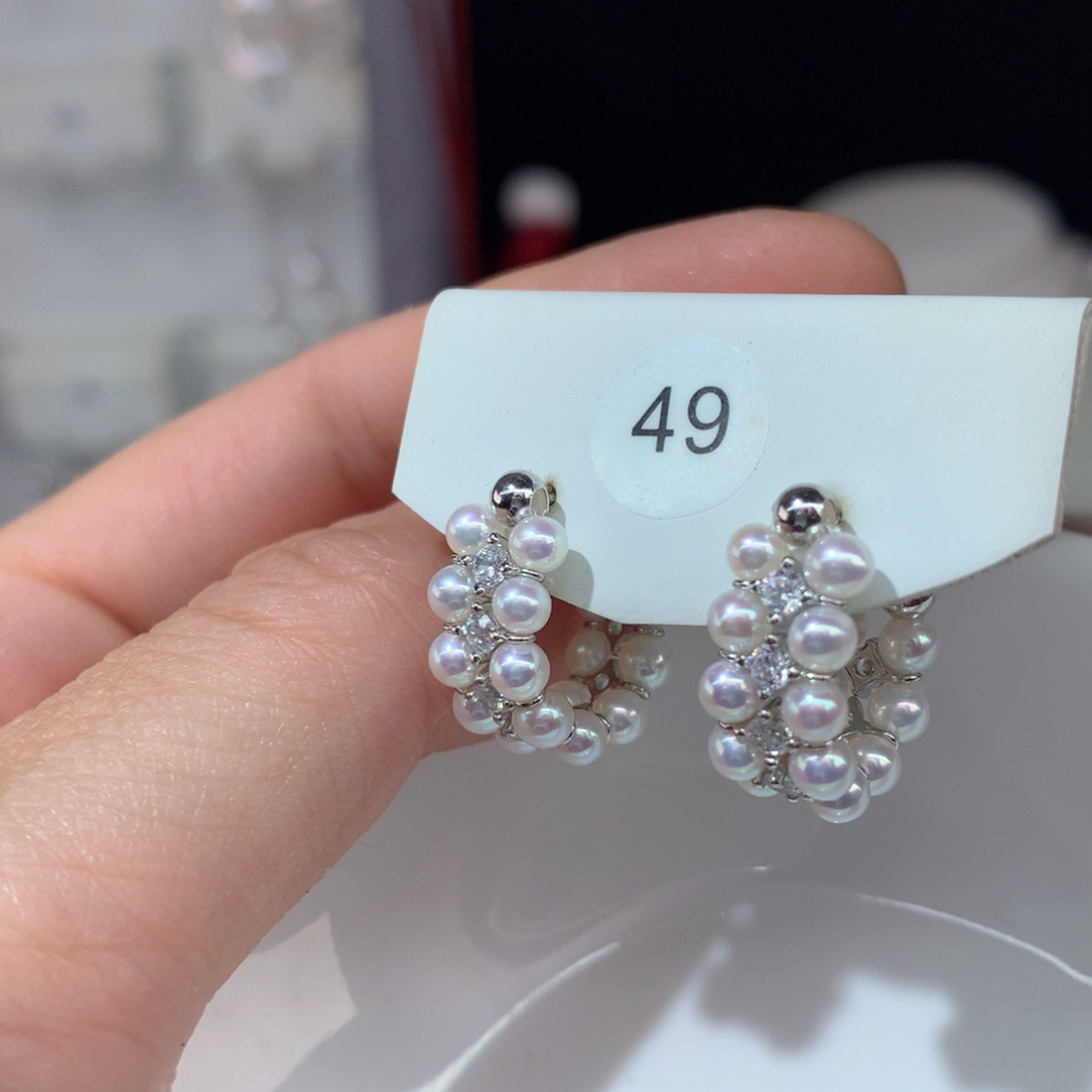 你***8淡水珍珠银S925镶嵌耳饰