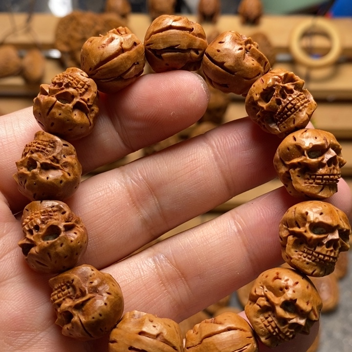 桃核手工雕刻骷髅手串