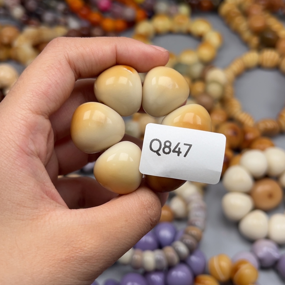 1***4吊坠菩提根/象牙果Q847蒜瓣21-24微瑕一串