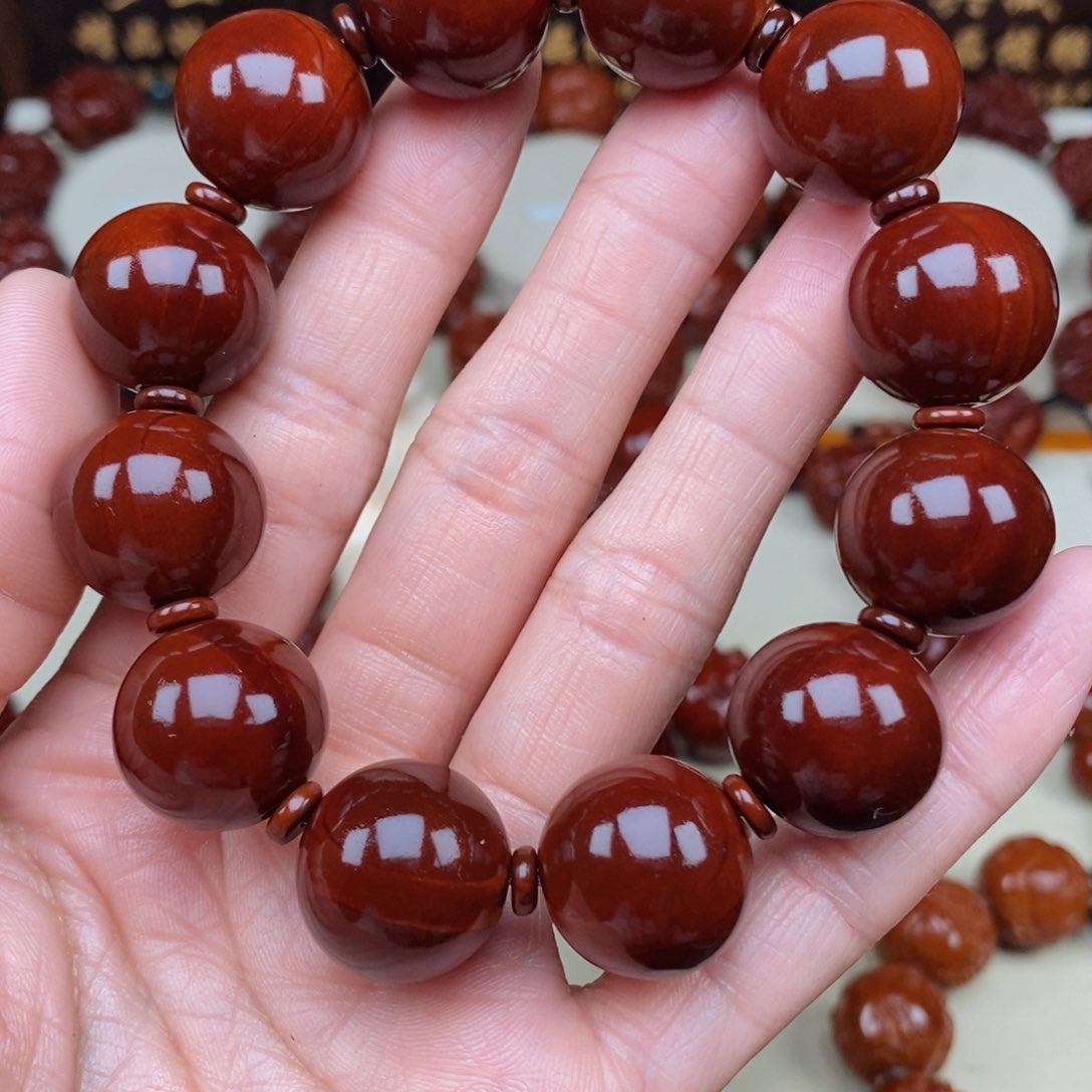 橄榄核吊坠M**程光珠，