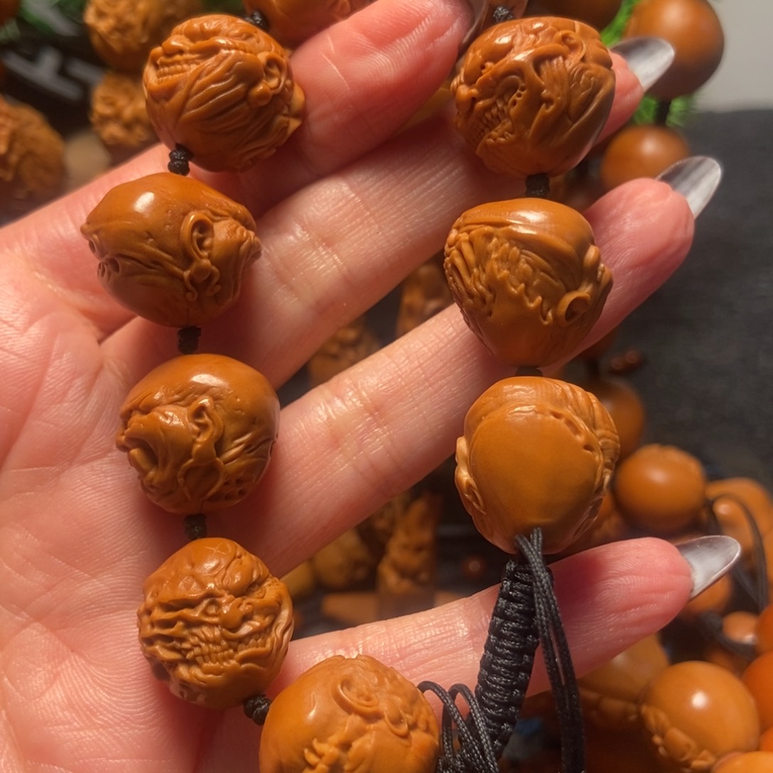 橄榄核吊坠向死而生