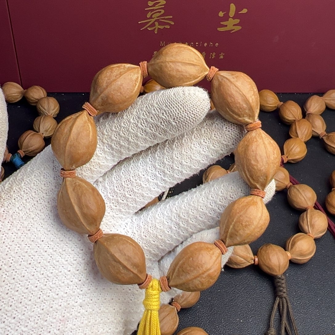 小***雪吊坠橄榄核梅林铁核19-27