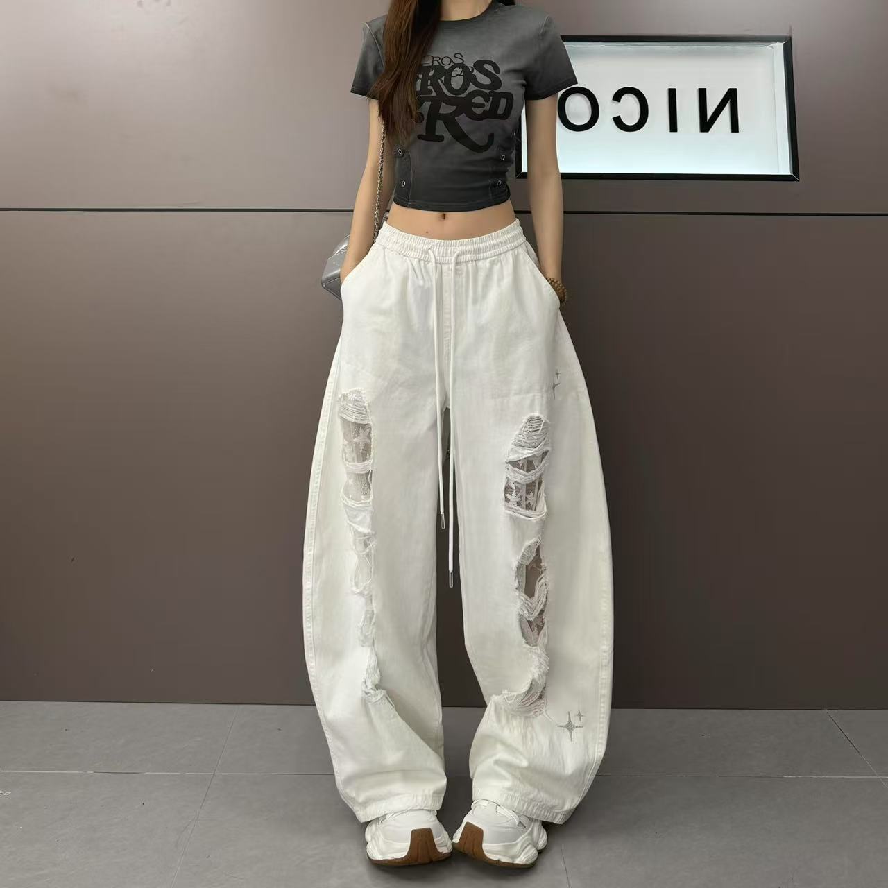 新美式街头复古拼接镂空蕾丝个性破洞设计时尚显瘦休闲裤