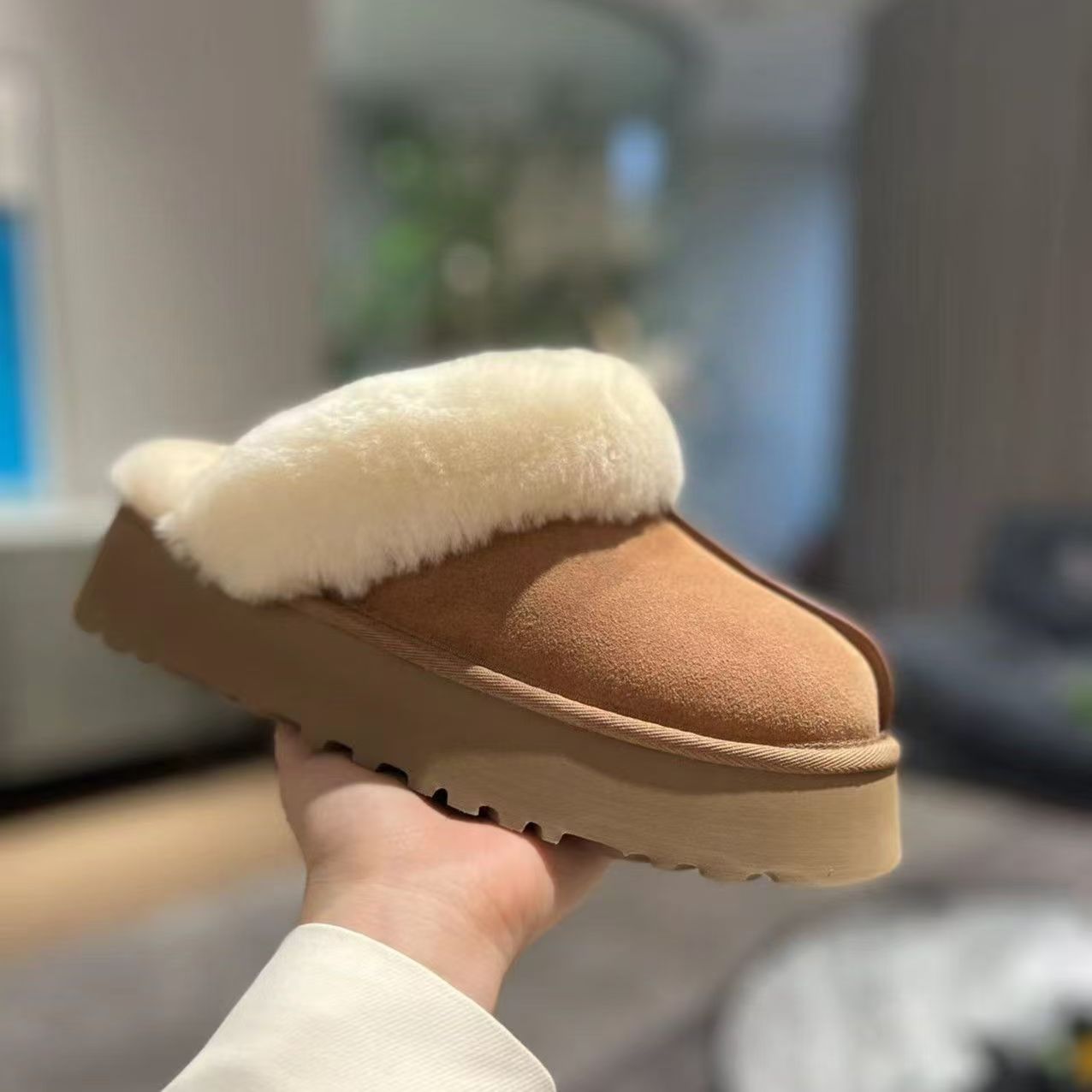 星拖款羊皮毛一体女保暖雪地靴