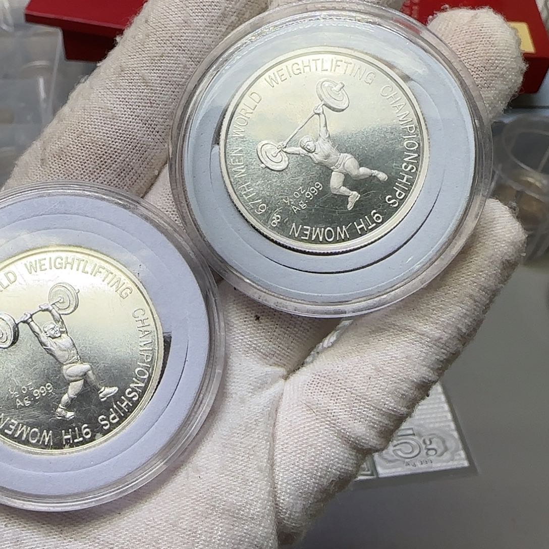 举重银章两枚福利出特价福利