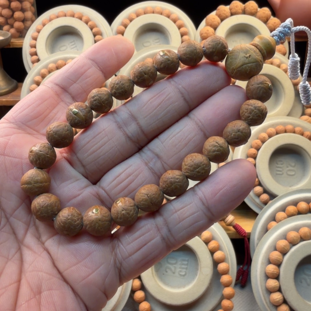 手串凤眼菩提11.5红油皮同树籽单仓厚皮铜钉镶嵌