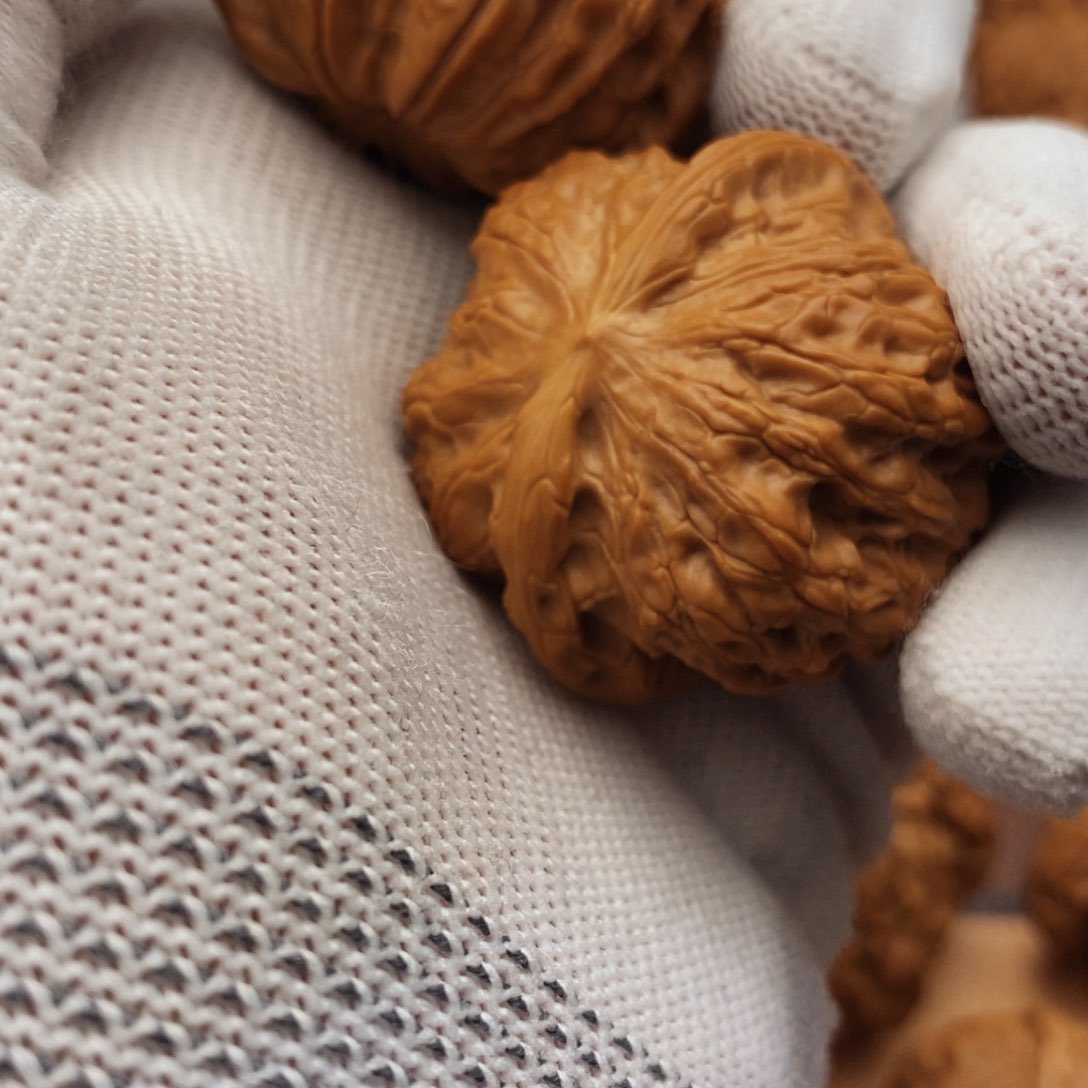 文玩核桃吊坠可***啡血麒麟