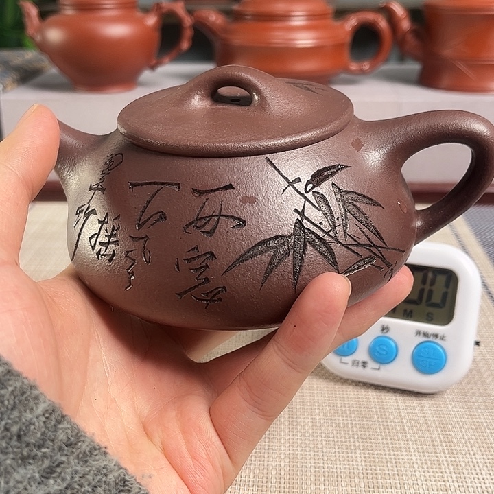 鲁***达紫砂茶杯宜兴原矿手工紫砂壶