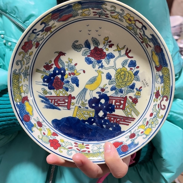 瓷片///////直径19厘米。黄。