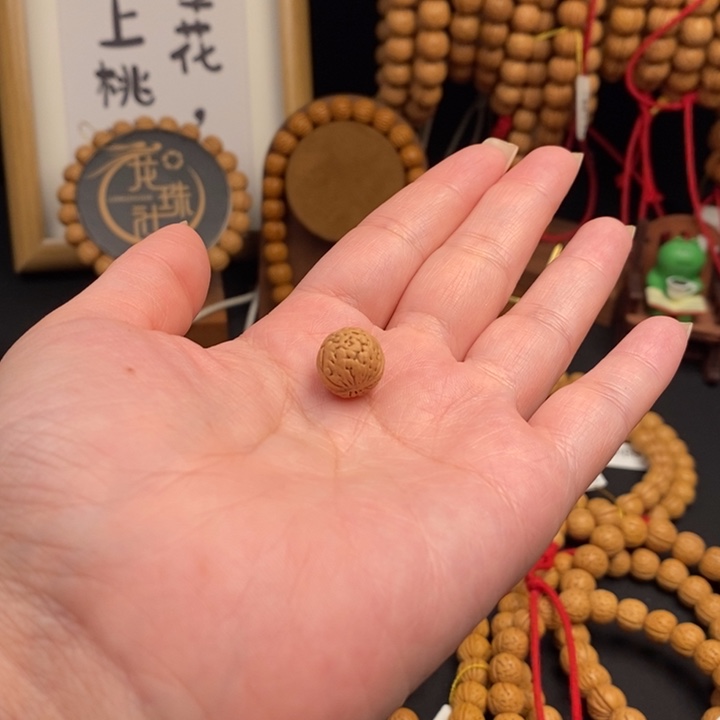 桃核手串三通一颗……