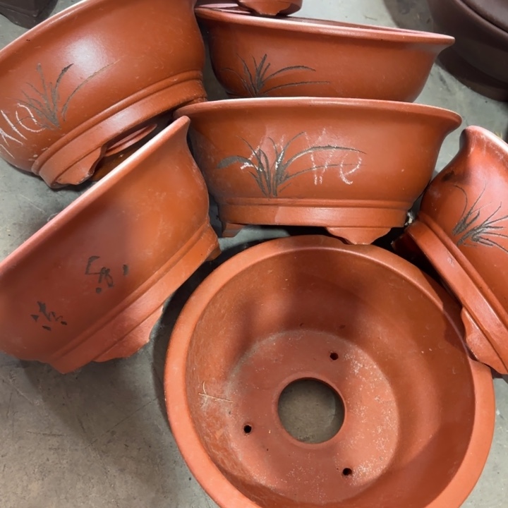 紫砂花盆100-7。        23-10