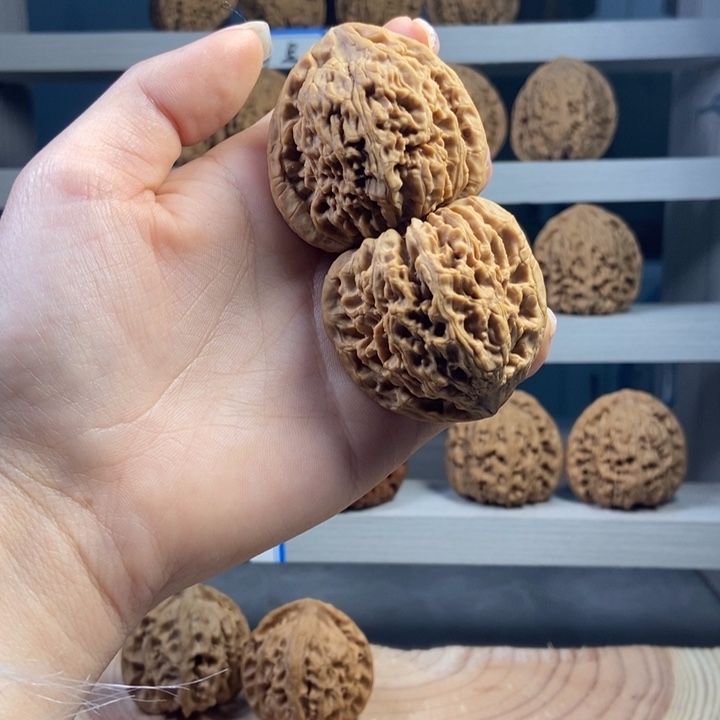 答***.文玩核桃吊坠正宗南疆石文玩核桃