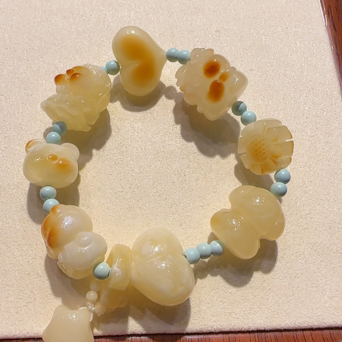 琥珀未镶嵌裸石蜜蜡可爱联盟多宝手串