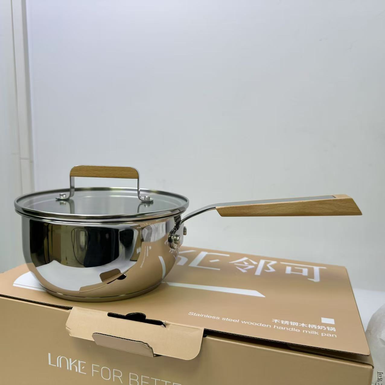 63438   不锈钢斜木柄奶锅（16cm）