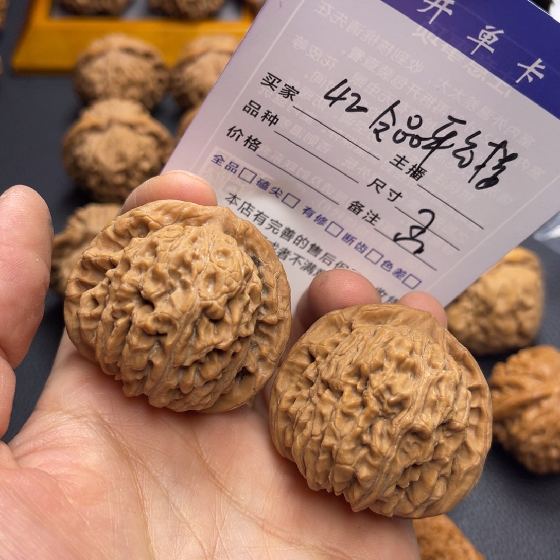 桃核把件42全品平谷楼。 孟