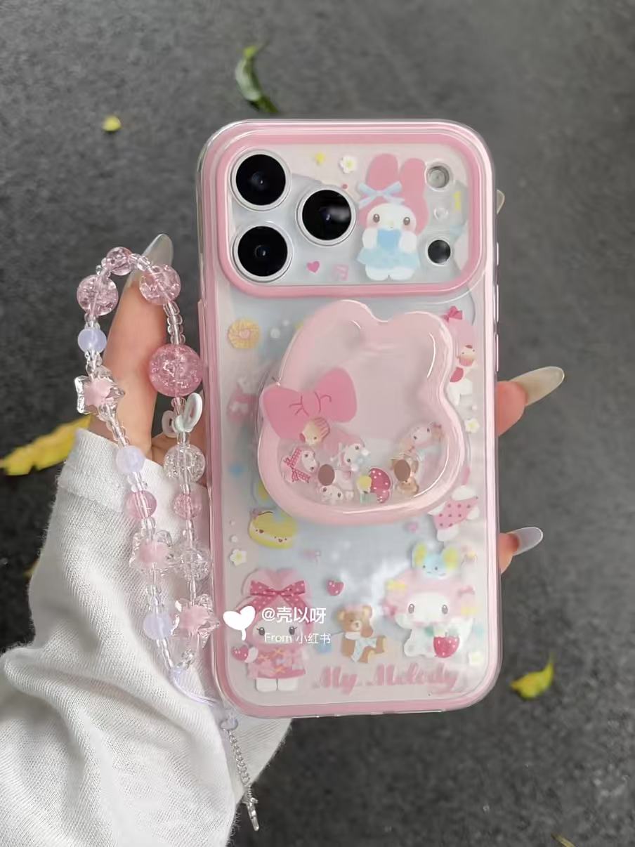 IMD二合一卡通草莓美乐蒂摇摇乐磁吸支架适用17promax/16手机壳