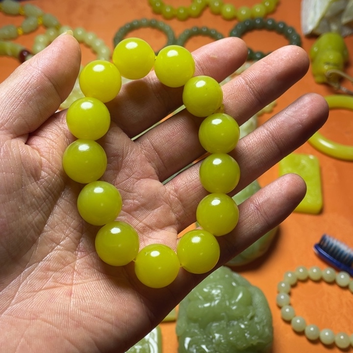 呆***Y非金属新疆黄玉卡16手串