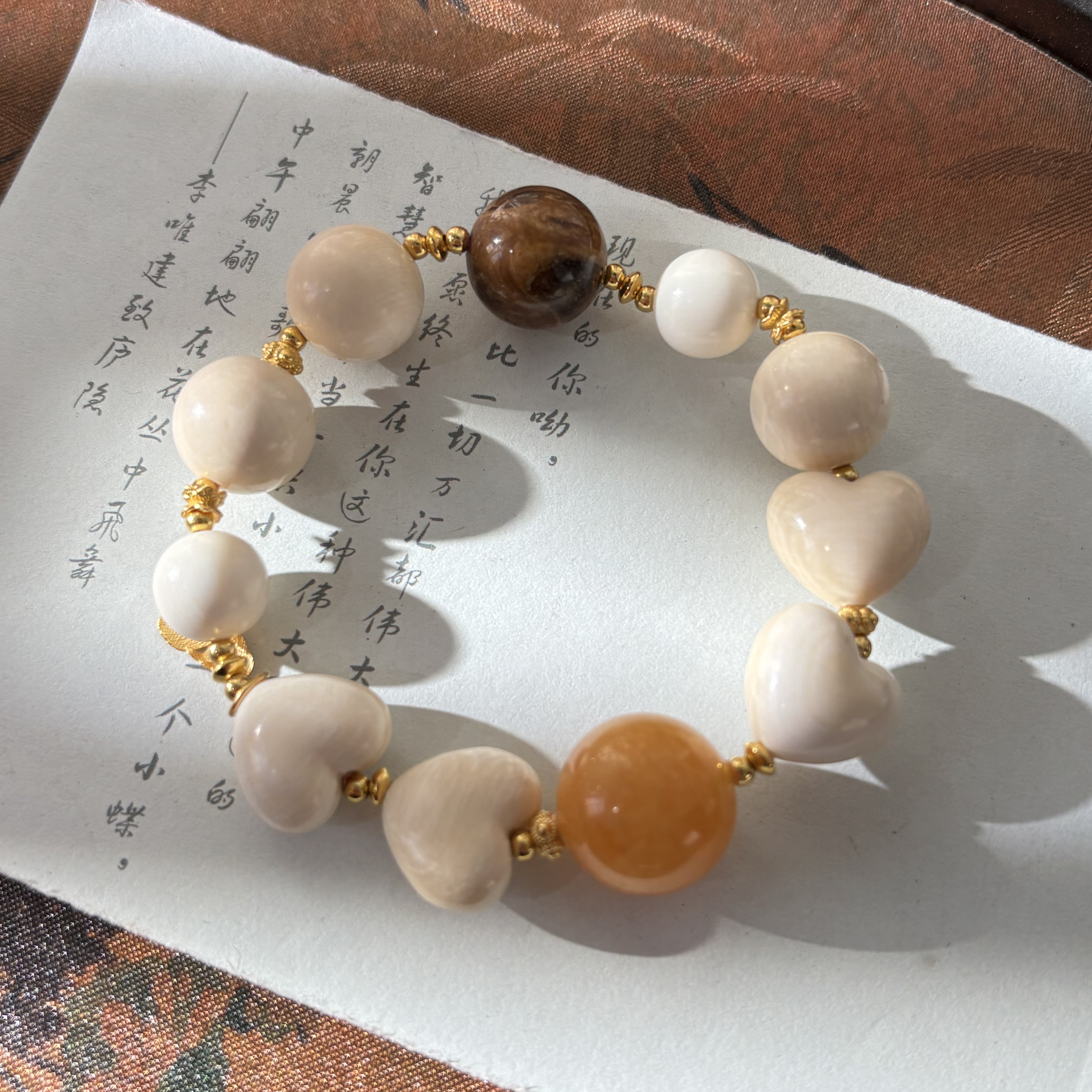 【金菀菀】猛犸牙爱心蜜蜜树叶手串